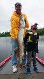 7 year old Fynn's first Musky! 51"
